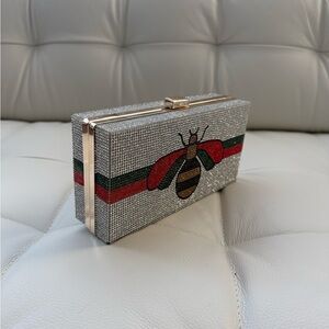 Elegant Silver Clutch with Bee Design